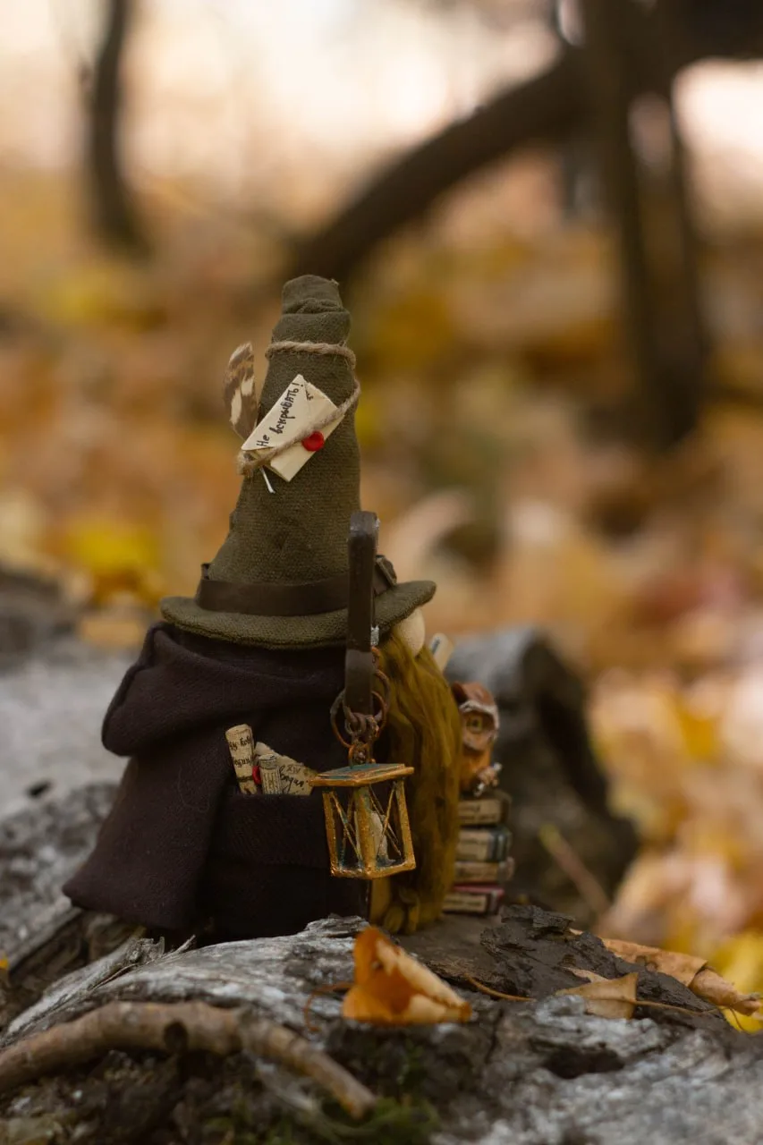 Gnome Archivist's copper lantern and archive key — detail closeup