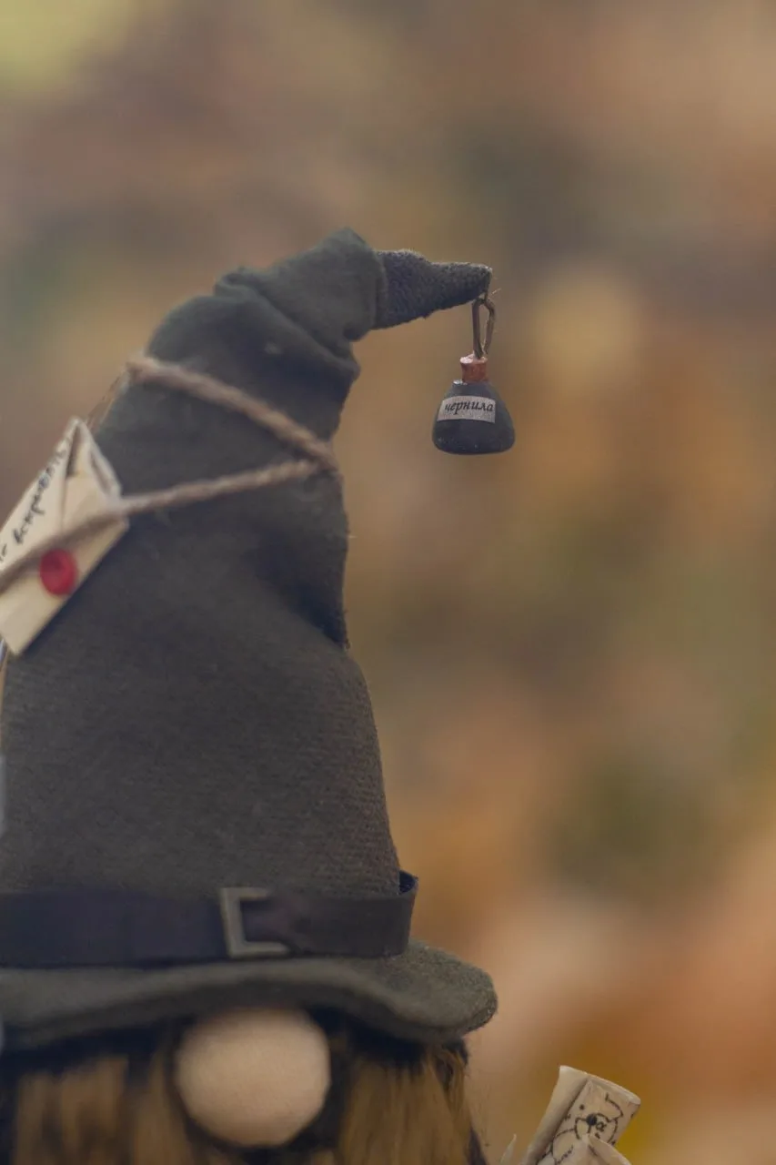 Gnome Archivist's hat with ink bottle and wax-sealed letter — closeup