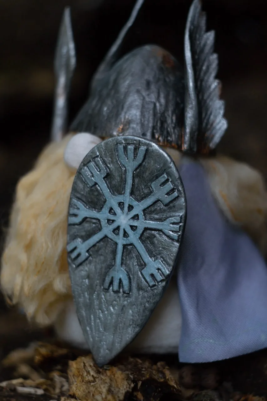 Aegishjalmur Helm of Awe rune shield — closeup of Nordic symbol on gnome shield