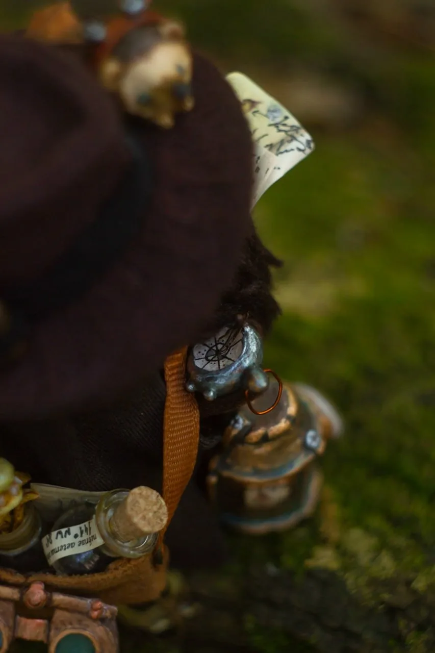 Anomaly compass and vial of sealed Ancient Forest darkness — detail