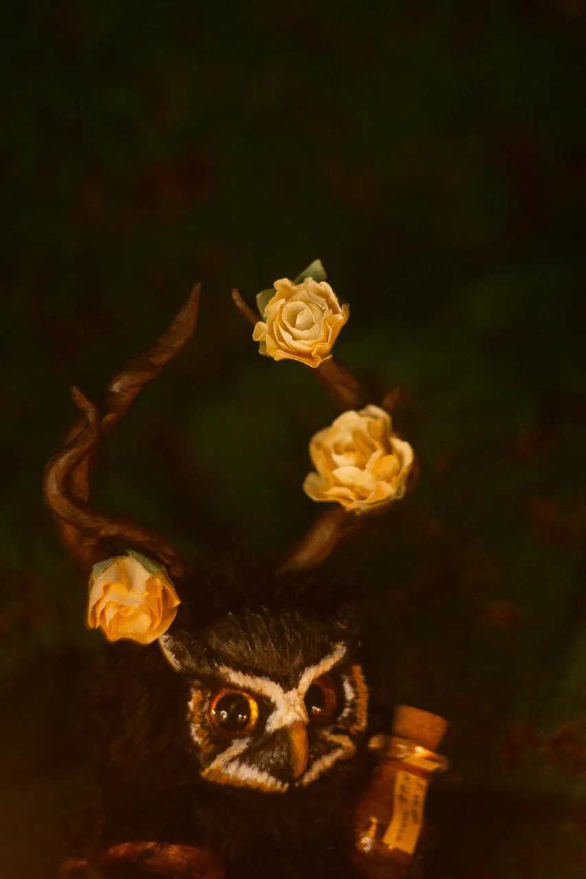 Alchemy Mystery fluffy — rose antlers with early spring blooms and miniature potion bottles