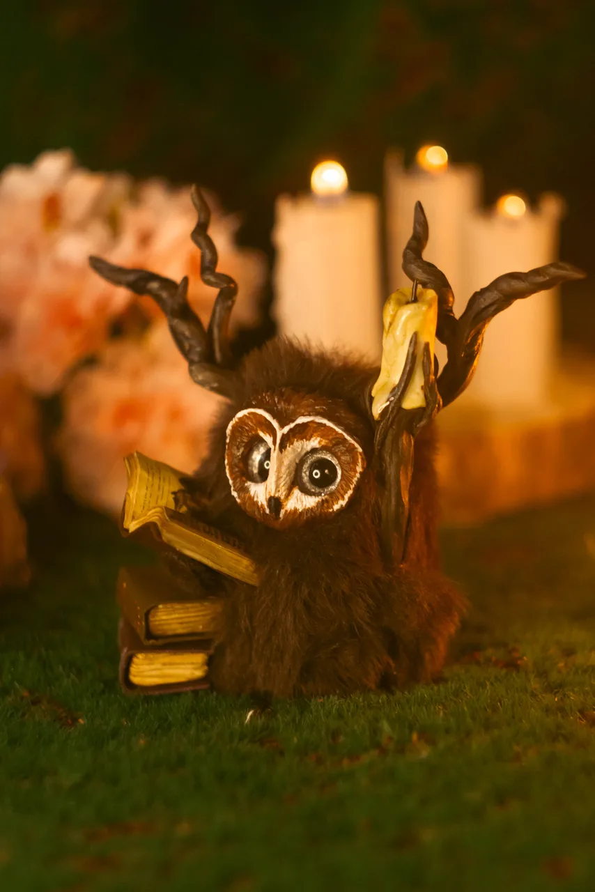 Rustle of Ancient Books — handmade wool Fluffy with branching antlers grown from reading, candlelit staff and old book, guardian of forgotten libraries | Gnomenlands