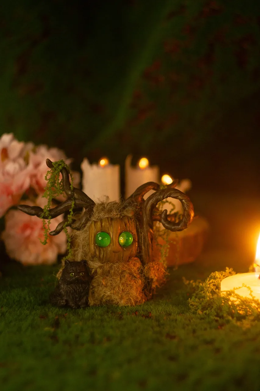 Forest Shaman Fluffy — handmade wool spirit grown from an old stump at the crossroads of three forest paths, with glowing spring-green eyes