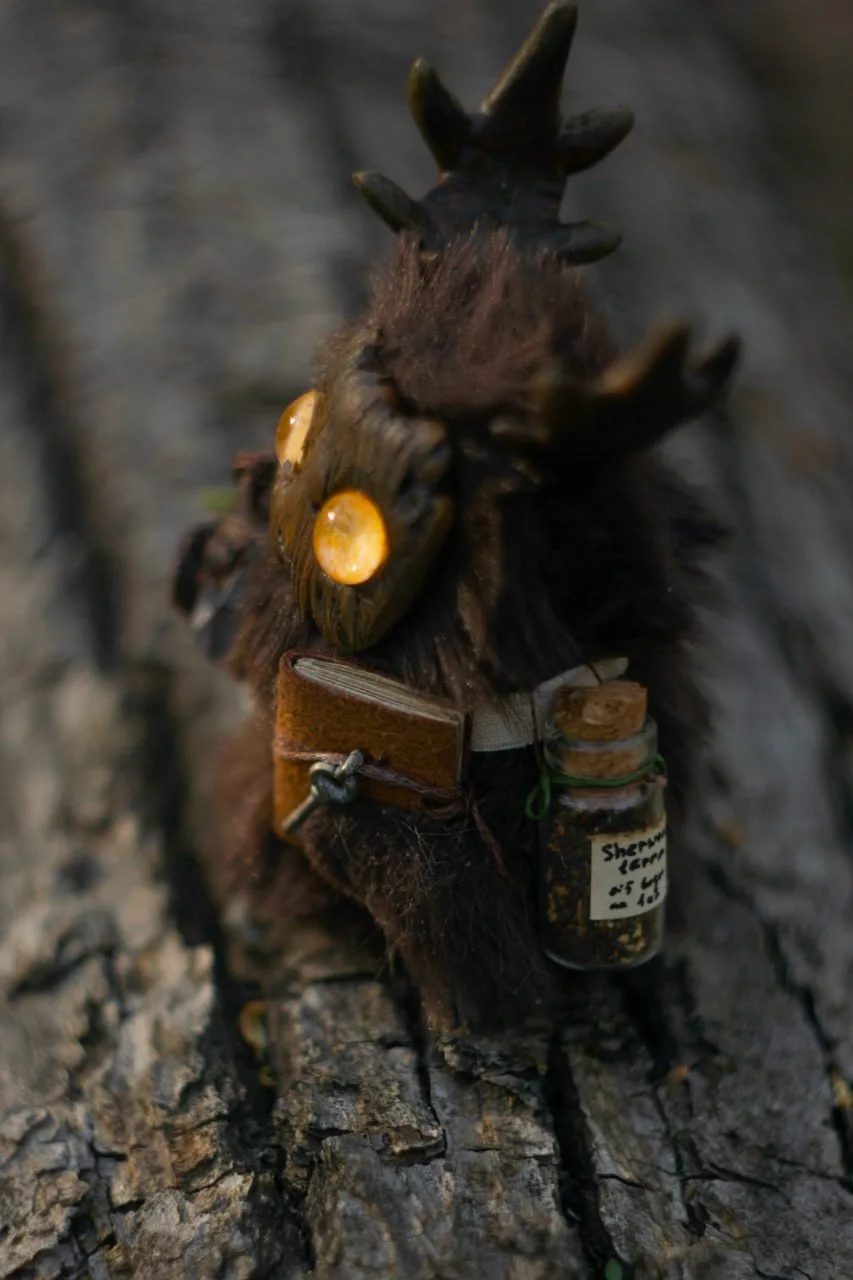 The Healer fluffy — notebook with recipes and glass vial of Sherwood Forest soil