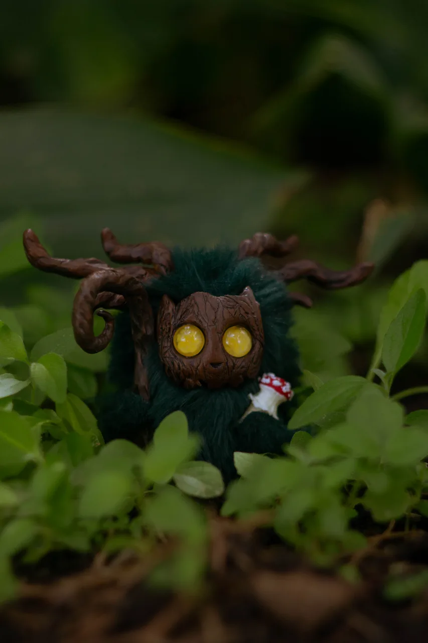 Mossy Flame — handmade wool Fluffy forest creature hiding in warm forest shadows among magnificent fly agaric mushrooms | Gnomenlands
