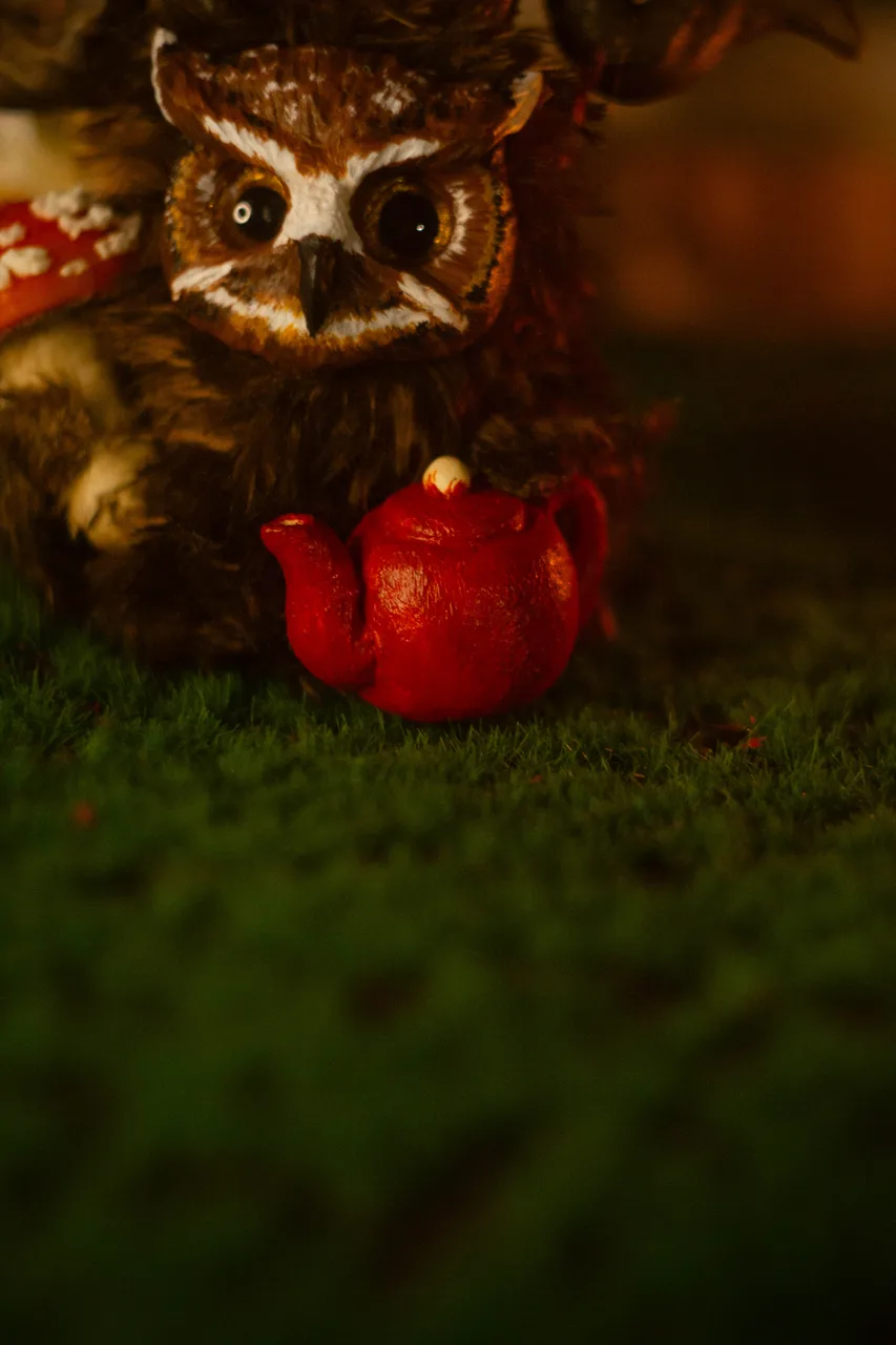Mushroom Guardian fluffy — with red teapot and bright red fly agaric mushrooms, curling antlers