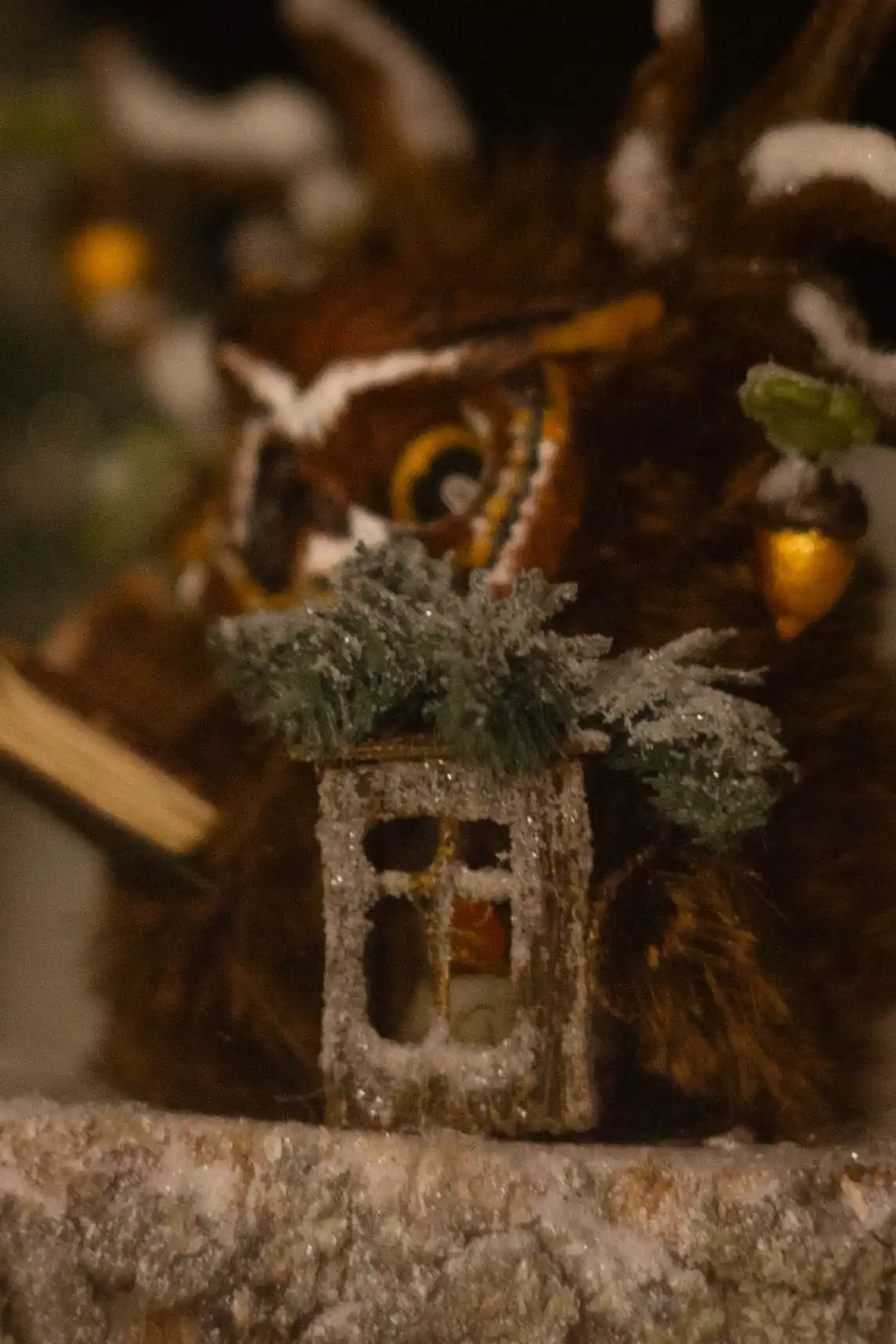 Hidden Knowledge fluffy -- side view with evergreen oak leaves on antlers