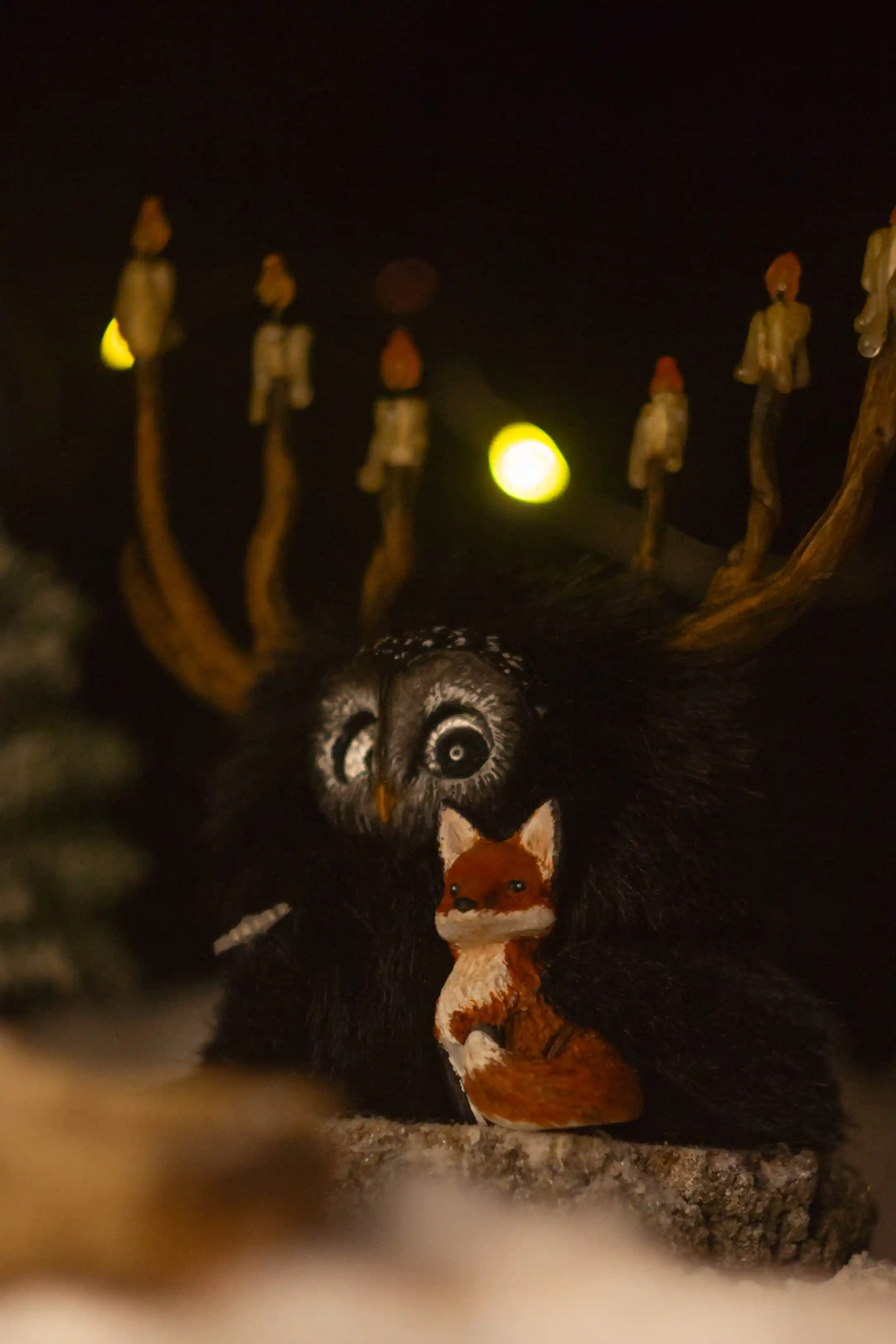 The Glow fluffy -- close-up of softly glowing, kind eyes in the dark