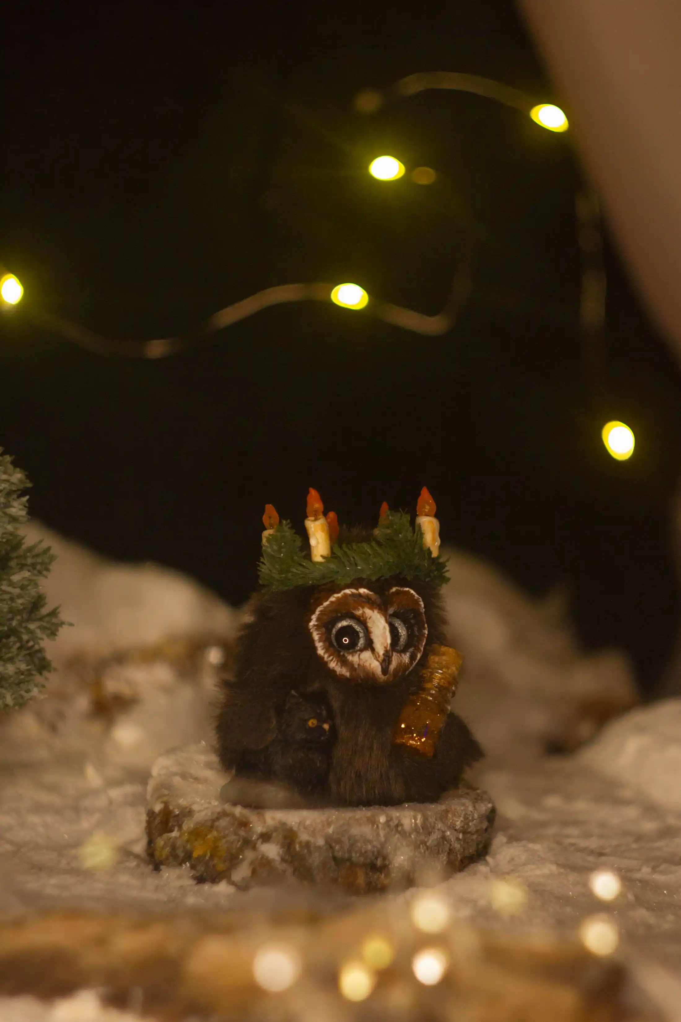 The Solemnity fluffy -- back view, holding a vial of sparkling magic essence