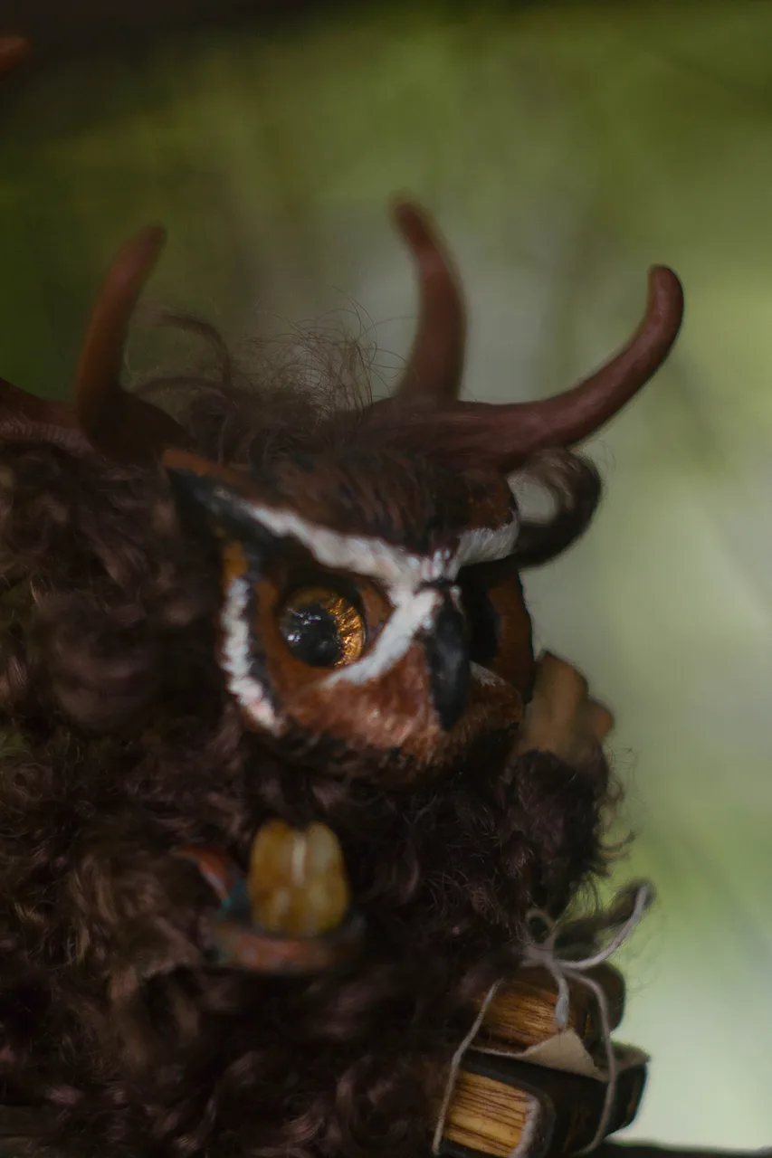 Wise Owl fluffy — side view showing antler branch detail and soft wool texture