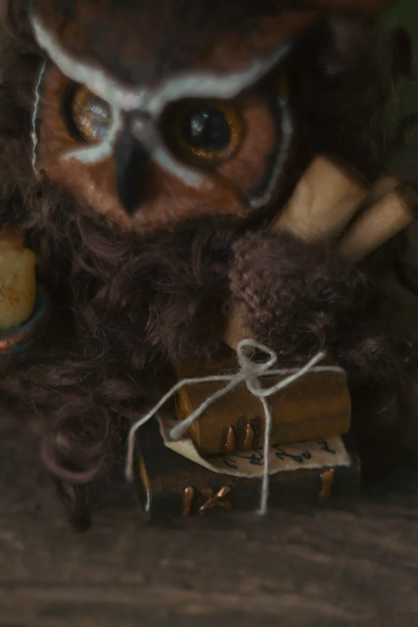 Wise Owl fluffy — atmospheric twilight view with candle glow in the forest