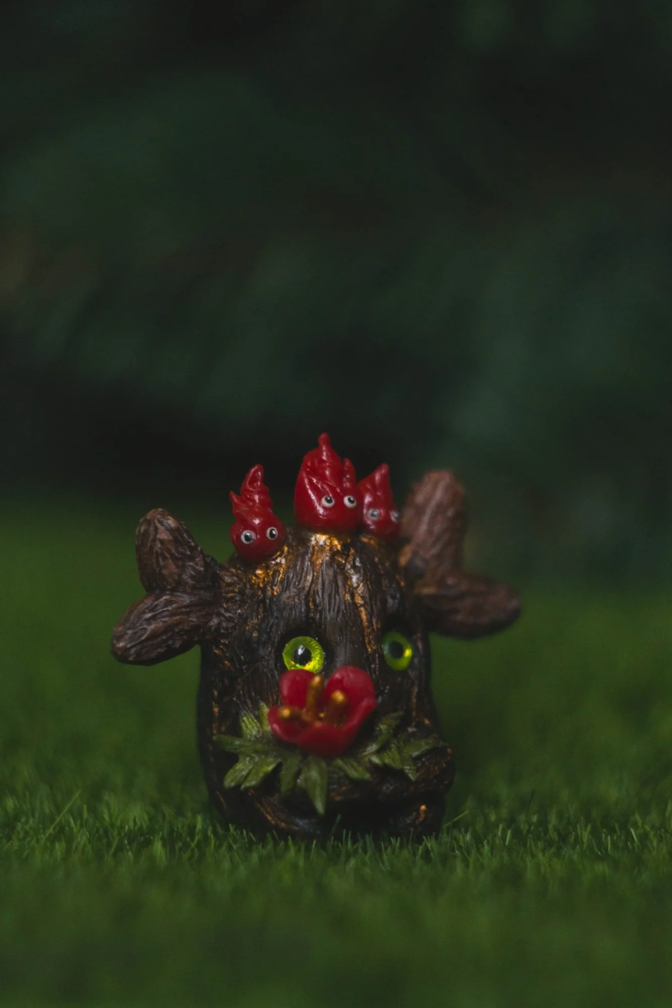 Forest Sprite Fire Spirit — front view, lime-green eyes and fire flower detail