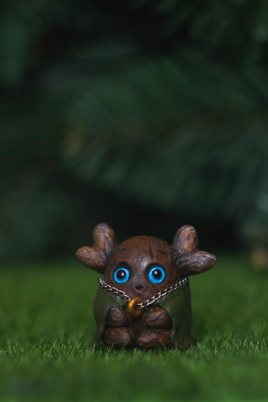 Forest Sprite Frodo — handmade LOTR-inspired polymer clay figurine, green cloak and One Ring | Gnomenlands