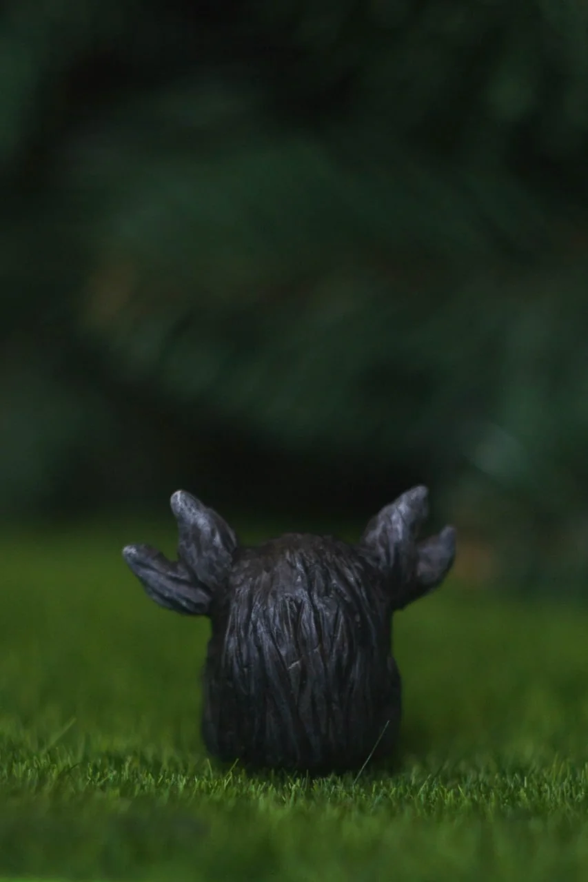 Forest Sprite Oracle — closeup side view, silver glitter visible inside the globe