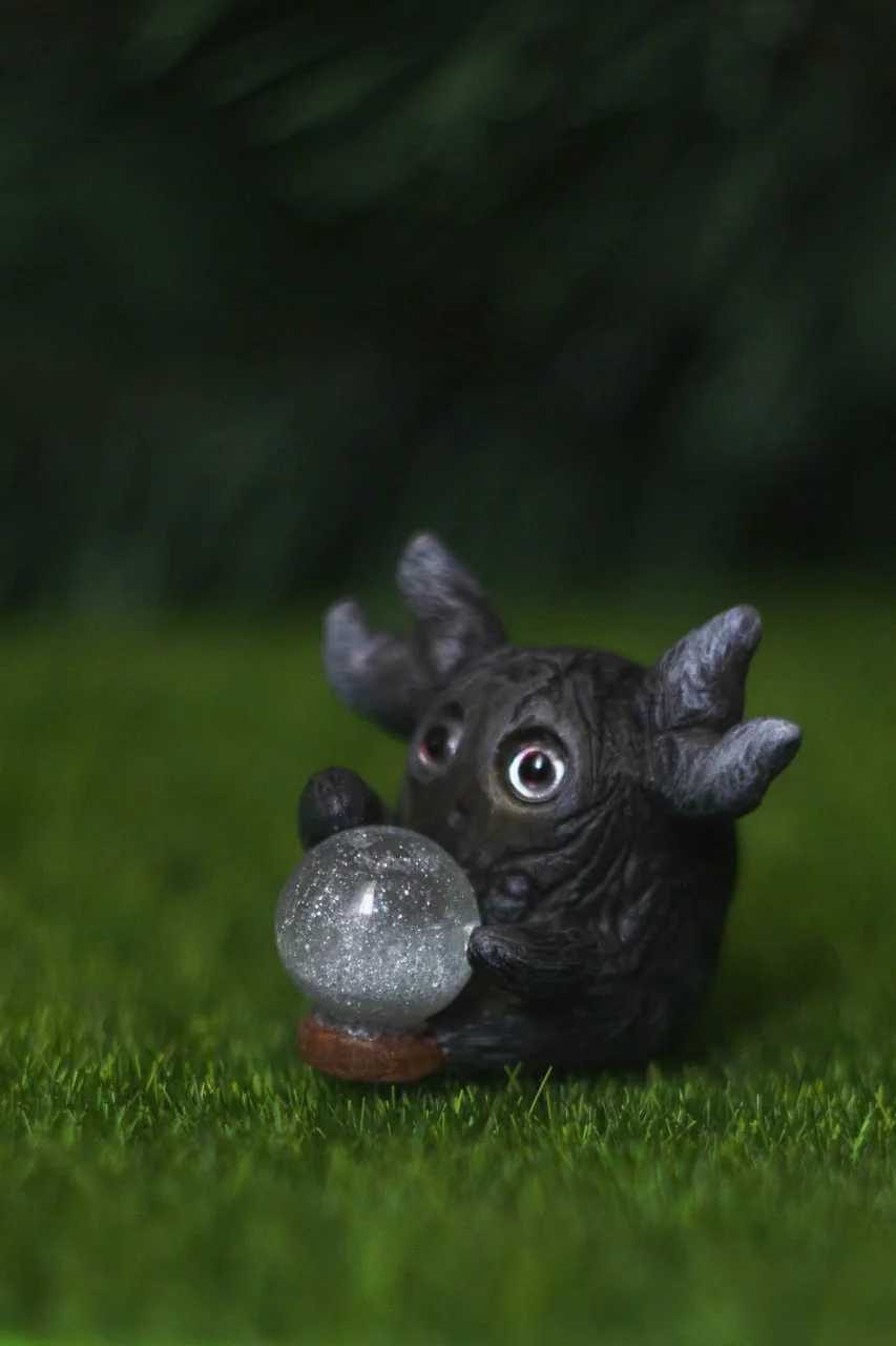 Forest Sprite Oracle — second front view, dark bark texture and snow globe