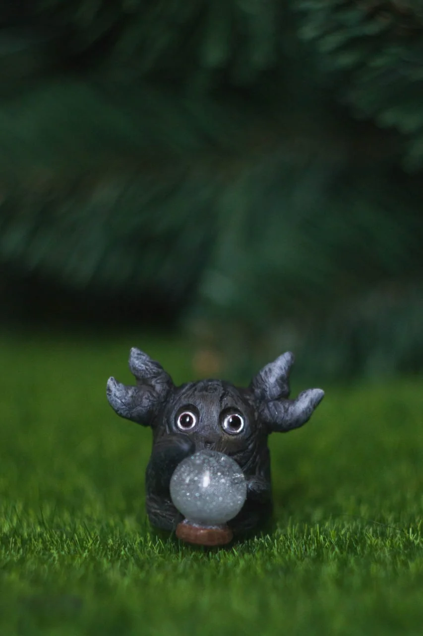 Forest Sprite Oracle — close front view showing antlers and glass snow globe detail
