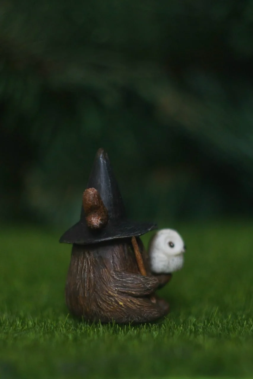 Forest Sprite Wizard — side view with snowy owl companion sitting beside the figurine