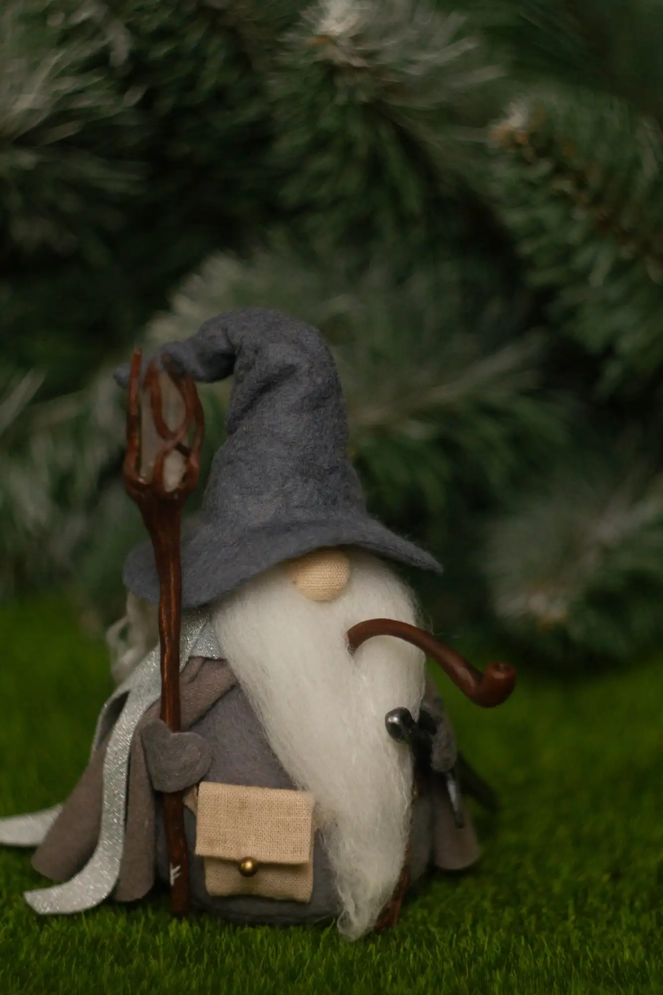Gandalf gnome with sword — front view, Glamdring blade detail closeup
