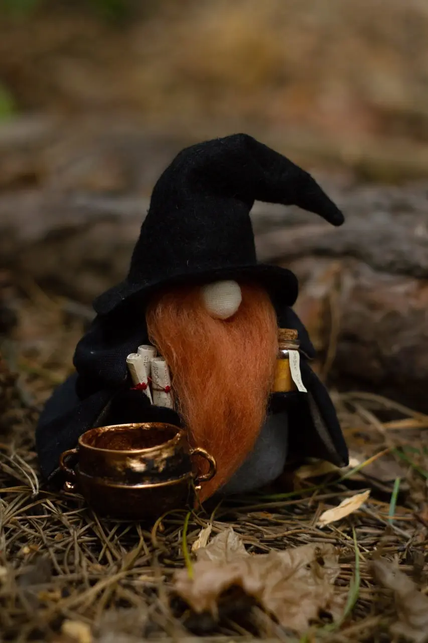 Collectible gnome in black robe with pointed hat
