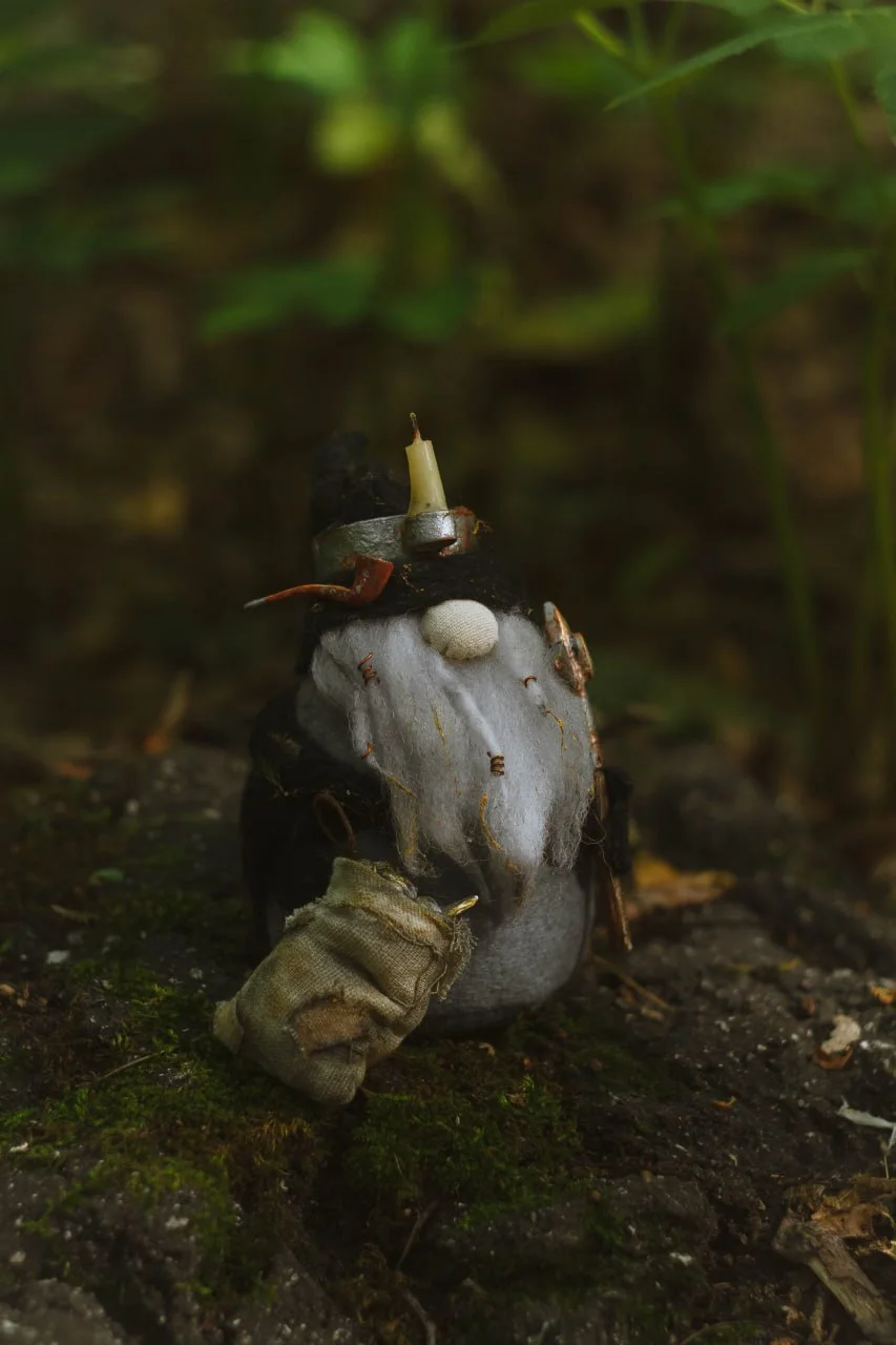 Interior Gnome Gold Digger with pickaxe engraved with Norse runes of wealth