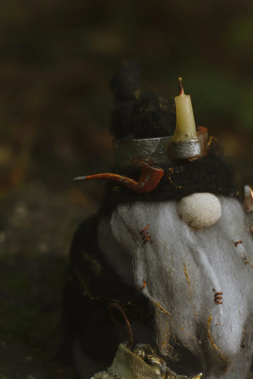 Gnome Gold Digger — closeup of hat with wax candle and smoking pipe