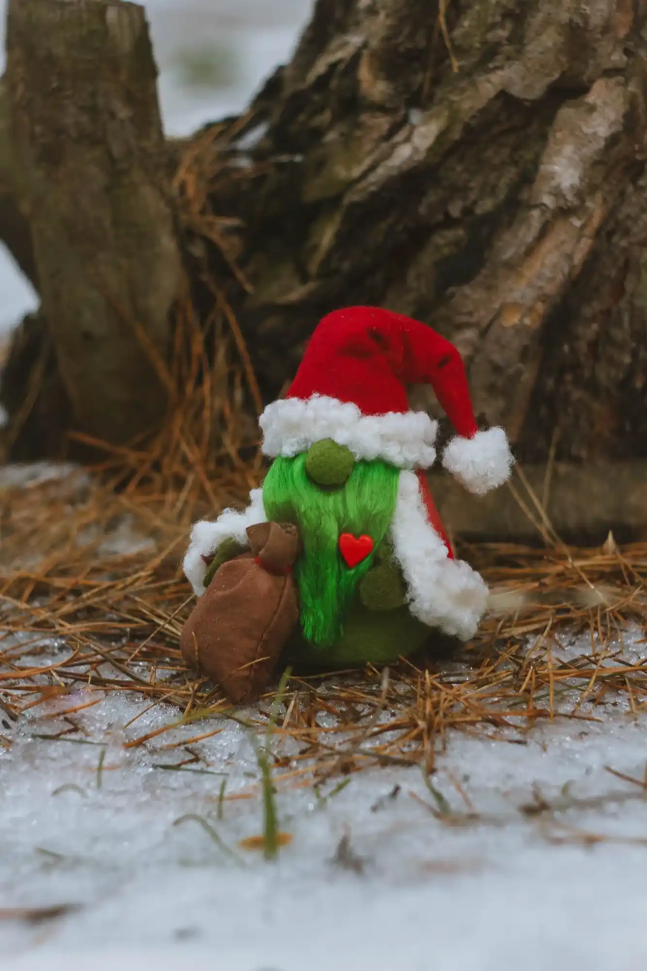 Yule Gnome Grinch — side view by tree with sack