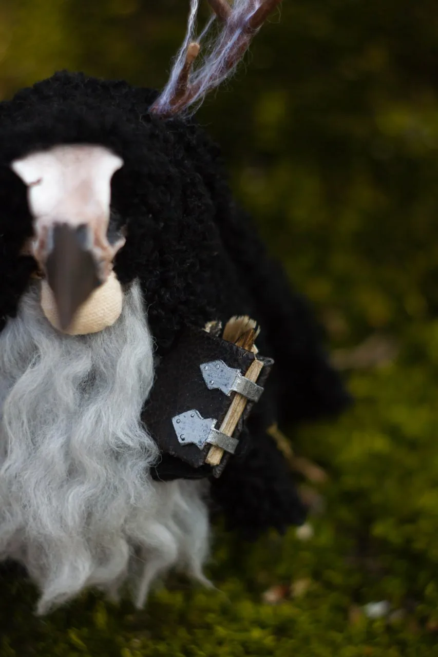 Leather-bound grimoire with metal clasps — wise gnome detail