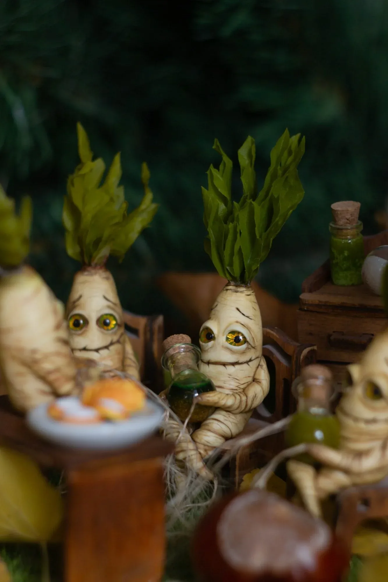 Handmade mandrakes at a potion table with glass bottles — polymer clay fantasy figurines