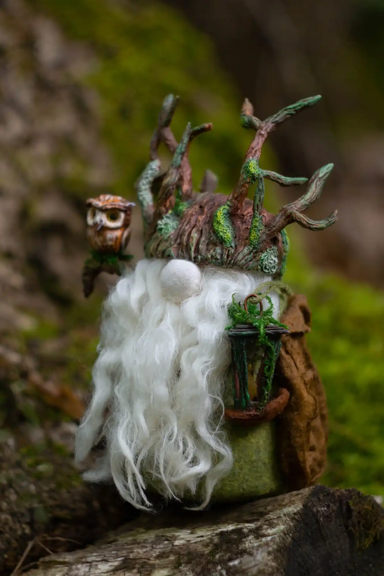 Gnome Night Warden — wax candle lantern, clay owl and branch helmet — closeup
