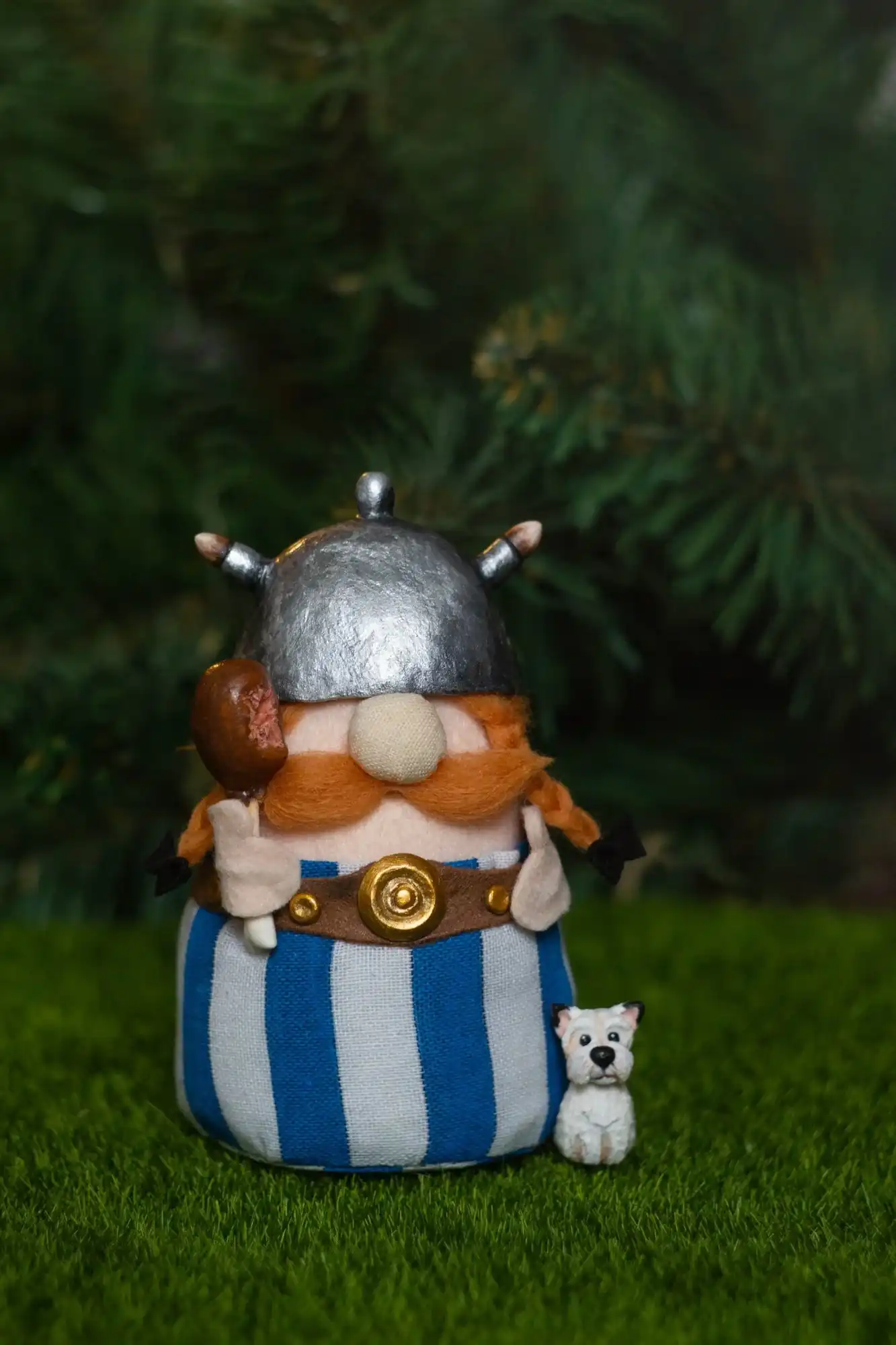Gnome Obelix — blue-and-white striped cotton trousers, gold belt buckle, Dogmatix beside him