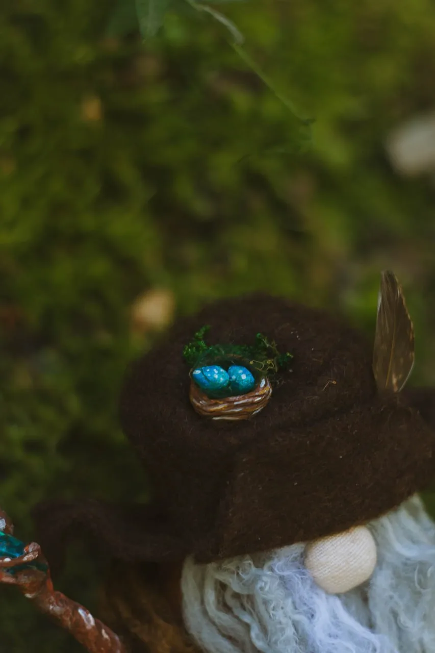 Bird nest with blue eggs on Gnome Radagast's hat — detail closeup