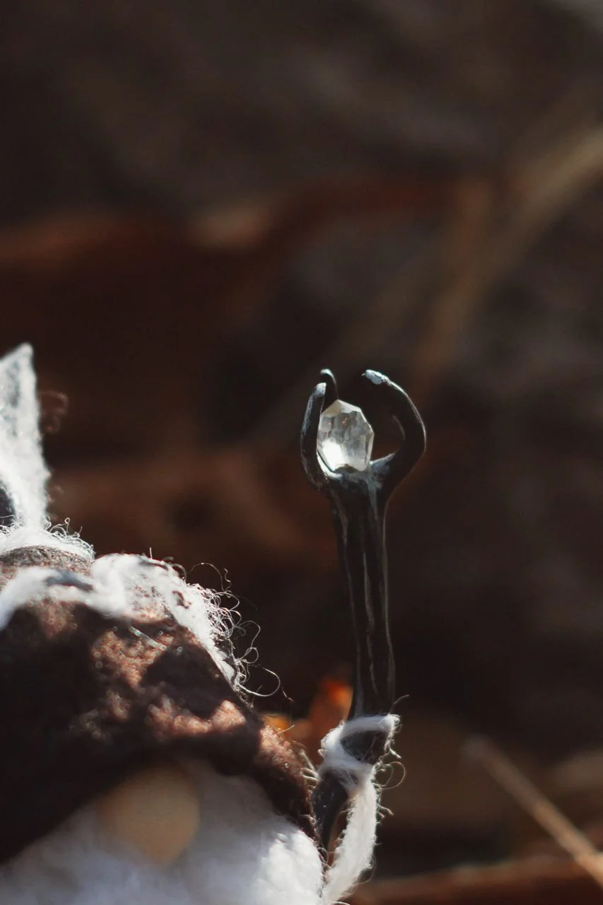 Gnome Raven Shaman's staff with raven feathers — detail closeup
