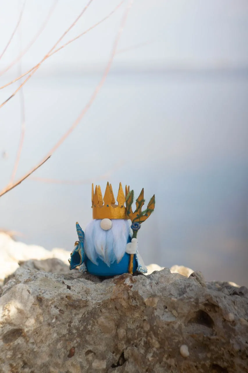Collectible Gnome Sea King on rock by water — handmade figure