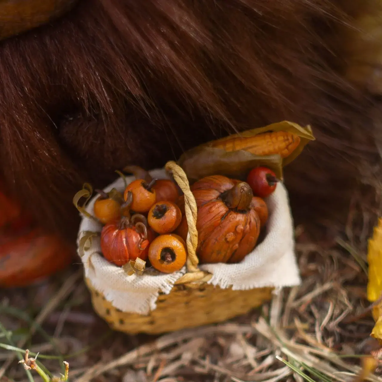 Fox companion of Wood Spirit Mabon Rustle — handmade polymer clay sculpture next to harvest basket, artisan miniature collectible detail