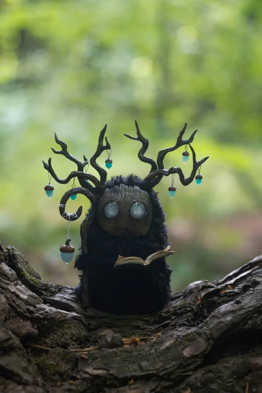 Wood Spirit Midnight Light — handmade collectible art figurine, woodland creature with glowing yellow glass eyes and acorns, artisan home décor