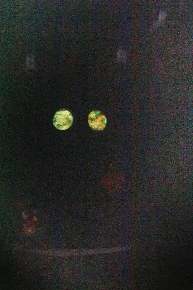 Wood Spirit Samhain Whisper in the dark — glowing amber eyes illuminating the night, handmade collectible gothic forest spirit figurine